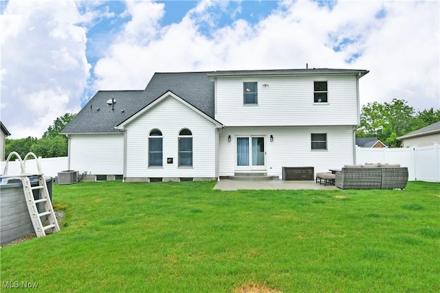 2304 Bianca Ln, Cortland, OH 44410 - rear view of house featuring an outdoor hangout area, a patio, a fenced backyard, and roof with shingles