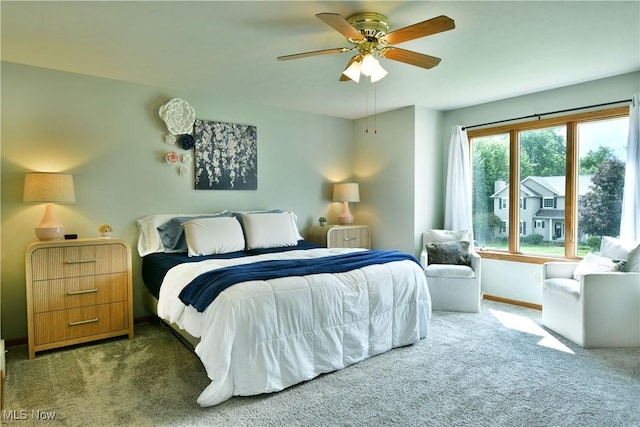 2304 Bianca Ln, Cortland, OH 44410 - carpeted bedroom featuring baseboards and a ceiling fan