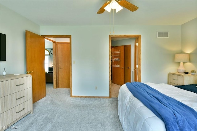 2304 Bianca Ln, Cortland, OH 44410 - bedroom featuring light colored carpet and a ceiling fan