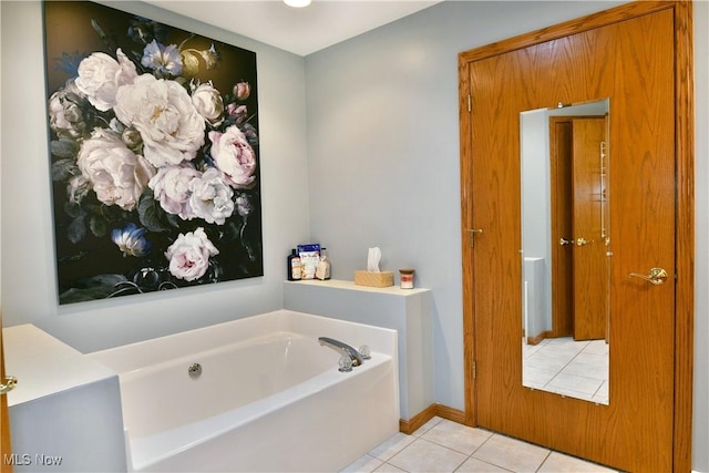 2304 Bianca Ln, Cortland, OH 44410 - bathroom featuring a garden tub and tile patterned flooring