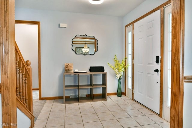 2304 Bianca Ln, Cortland, OH 44410 - entrance foyer with stairs and tile patterned floors