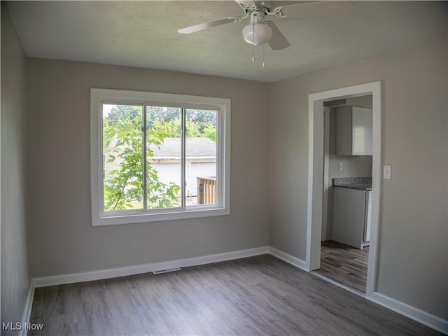 3814 Russell Ave, Parma, OH 44134 - spare room featuring wood finished floors and a ceiling fan