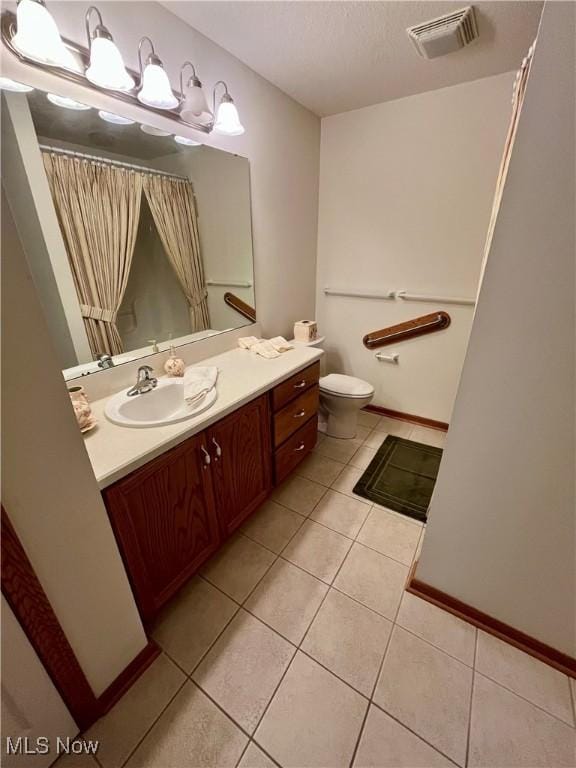 9264 Sharrott Rd Unit 104, Youngstown, OH 44514 - full bath with vanity, tile patterned flooring, and curtained shower