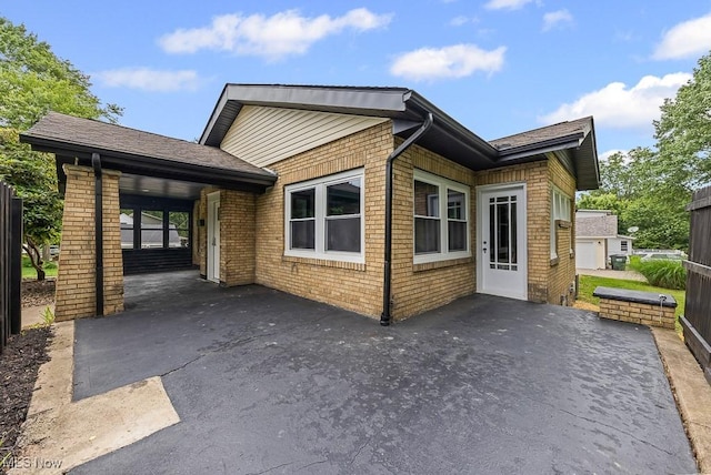3549 Kent Rd, Stow, OH 44224 - view of side of property with brick siding and roof with shingles