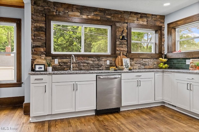 3549 Kent Rd, Stow, OH 44224 - kitchen featuring dishwasher, light stone counters, white cabinetry, and decorative backsplash