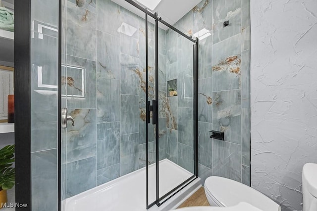 3549 Kent Rd, Stow, OH 44224 - bathroom featuring toilet and a shower stall