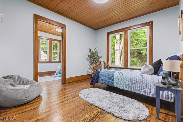 3549 Kent Rd, Stow, OH 44224 - bedroom with wooden ceiling, multiple windows, and wood finished floors