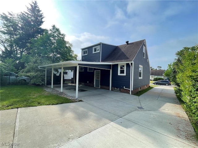 16005 Walvern Blvd, Maple Heights, OH 44137 - view of front of house featuring concrete driveway, a front yard, a carport, and roof with shingles