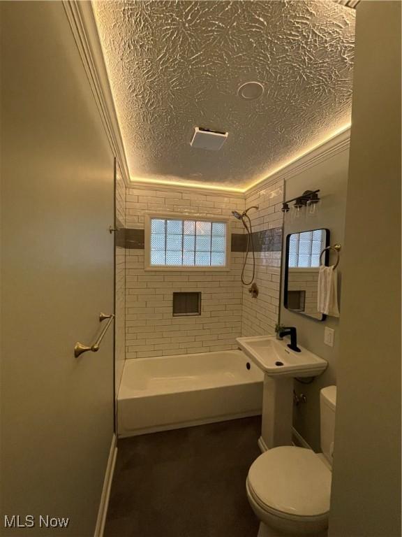 16005 Walvern Blvd, Maple Heights, OH 44137 - full bathroom with a textured ceiling, shower / washtub combination, and ornamental molding