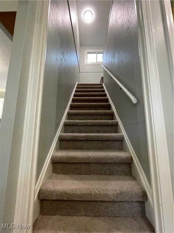 16005 Walvern Blvd, Maple Heights, OH 44137 - stairway with baseboards