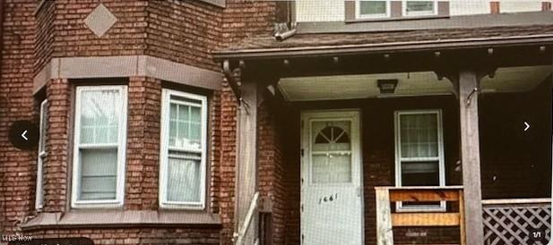 1661 E 118th St, Cleveland, OH 44106 - property entrance with brick siding