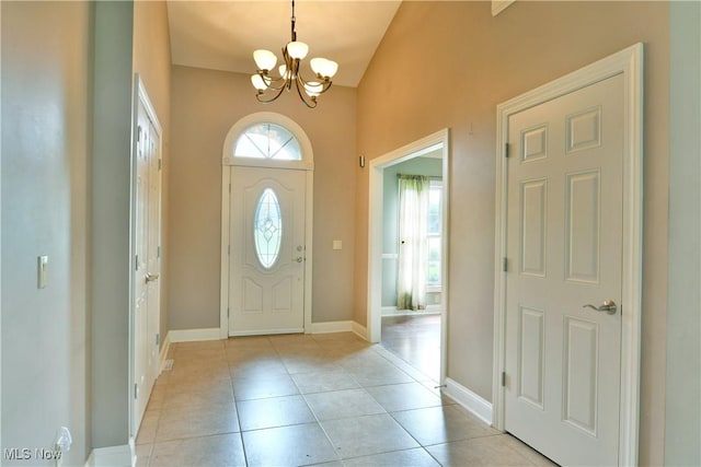 3455 Winners Cir, Canfield, OH 44406 - foyer entrance with a chandelier, light tile patterned floors, and lofted ceiling