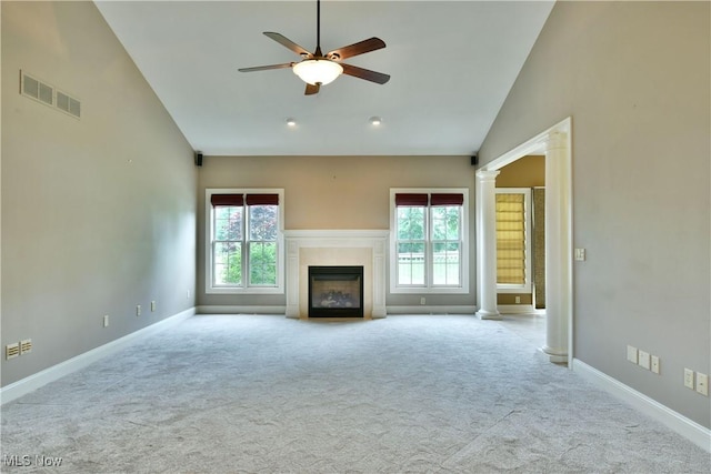 3455 Winners Cir, Canfield, OH 44406 - unfurnished living room featuring vaulted ceiling, ornate columns, a ceiling fan, carpet floors, and healthy amount of natural light