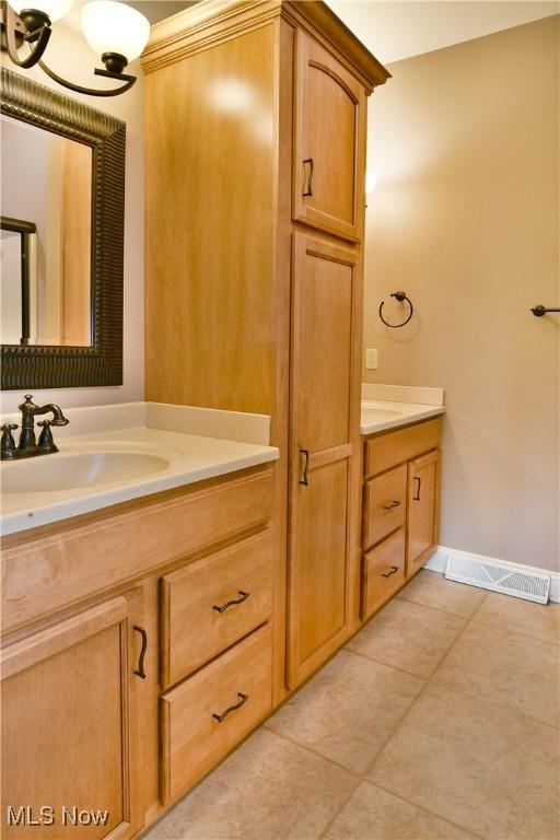 3455 Winners Cir, Canfield, OH 44406 - bathroom featuring vanity and tile patterned flooring