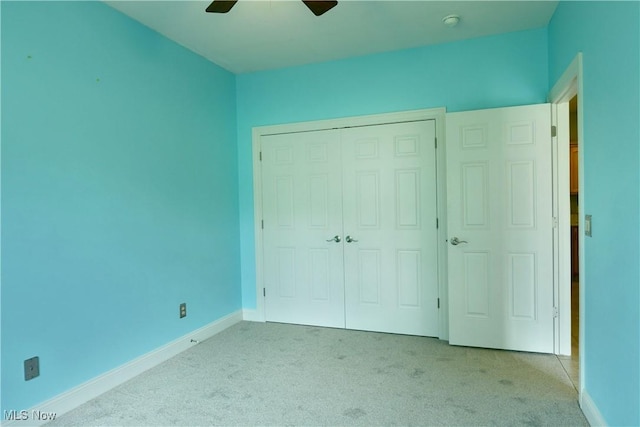 3455 Winners Cir, Canfield, OH 44406 - unfurnished bedroom with light carpet, a closet, and ceiling fan