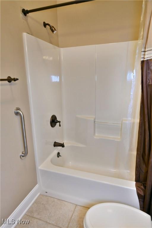 3455 Winners Cir, Canfield, OH 44406 - full bathroom featuring tile patterned floors and shower / bath combination with curtain