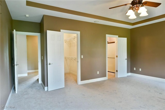 3455 Winners Cir, Canfield, OH 44406 - unfurnished bedroom with light colored carpet, a spacious closet, a closet, and a ceiling fan