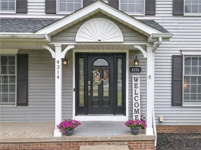 4314 Cheval Cir, Stow, OH 44224 - doorway to property with roof with shingles