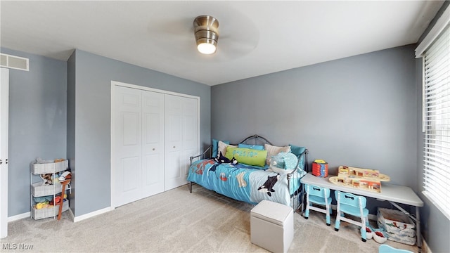 4314 Cheval Cir, Stow, OH 44224 - bedroom with a closet, multiple windows, carpet floors, and ceiling fan