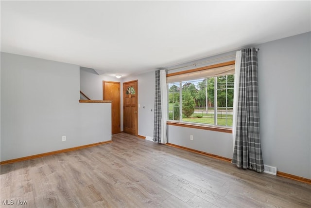 541 Broad St, Wadsworth, OH 44281 - unfurnished room featuring wood finished floors and stairs