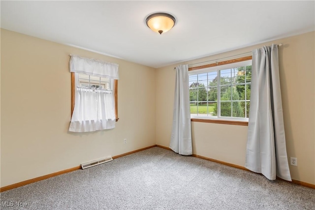 541 Broad St, Wadsworth, OH 44281 - carpeted empty room featuring baseboards