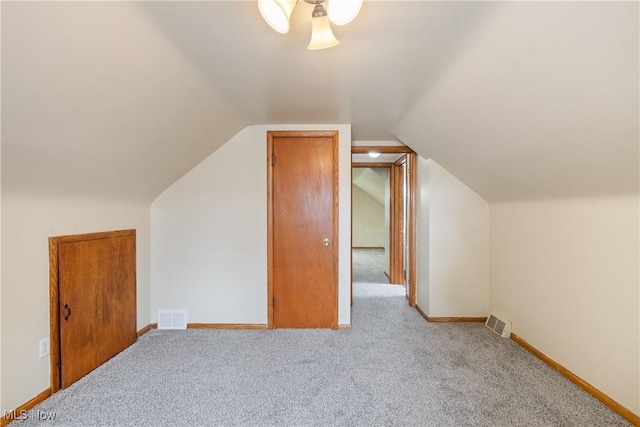541 Broad St, Wadsworth, OH 44281 - additional living space with carpet and vaulted ceiling