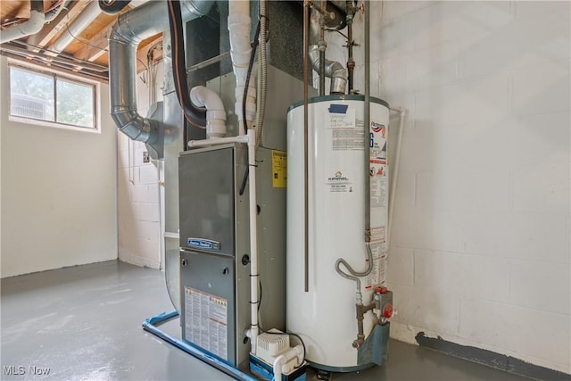 541 Broad St, Wadsworth, OH 44281 - utility room featuring water heater and heating unit
