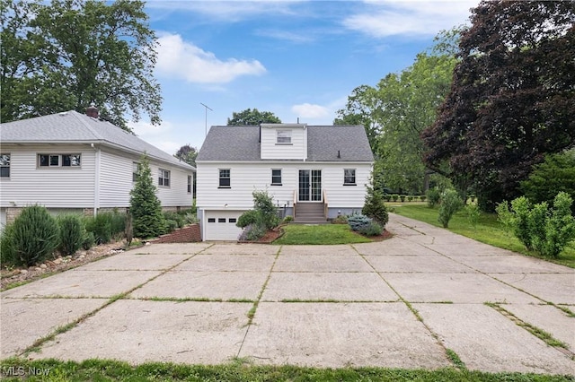 541 Broad St, Wadsworth, OH 44281 - back of house with driveway and a garage