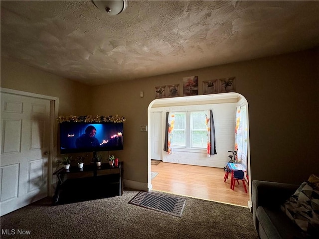 1201 Jackson St SW, Massillon, OH 44647 - living room featuring carpet floors and baseboards