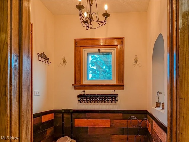 414 W Maple St, Hartville, OH 44632 - bathroom with a chandelier