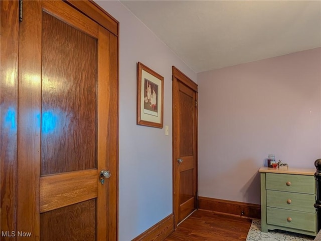 414 W Maple St, Hartville, OH 44632 - corridor with wood finished floors and baseboards