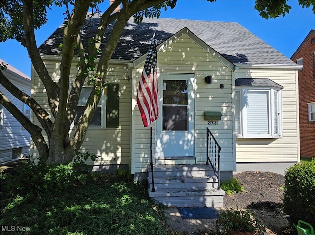 21731 Nicholas Ave, Euclid, OH 44123 - view of front of house featuring roof with shingles