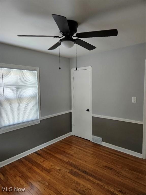 21731 Nicholas Ave, Euclid, OH 44123 - spare room with a ceiling fan and wood finished floors
