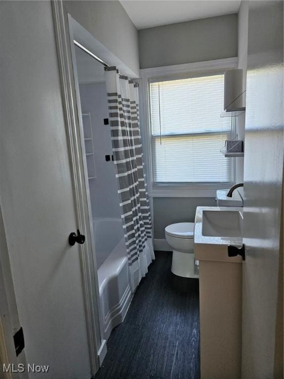 21731 Nicholas Ave, Euclid, OH 44123 - bathroom featuring vanity, wood finished floors, and shower / bath combination with curtain