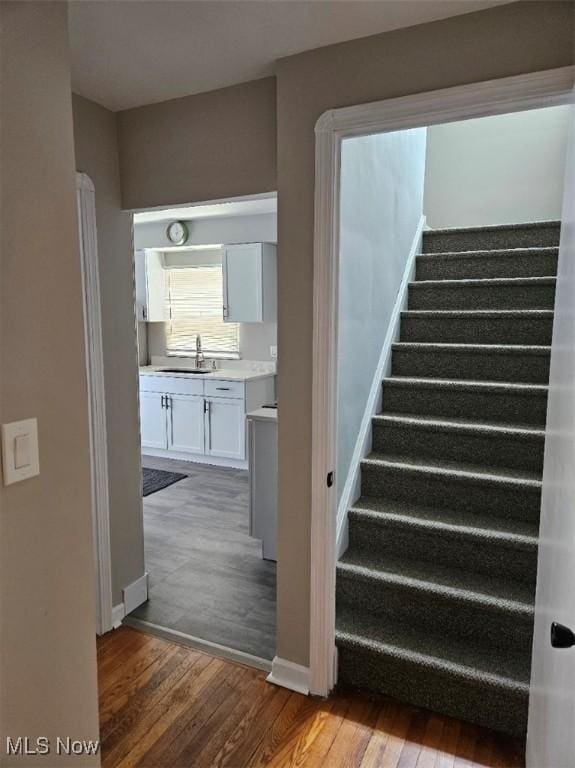 21731 Nicholas Ave, Euclid, OH 44123 - staircase with wood finished floors and baseboards