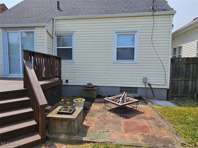 21731 Nicholas Ave, Euclid, OH 44123 - back of house with an outdoor fire pit, a deck, and a shingled roof