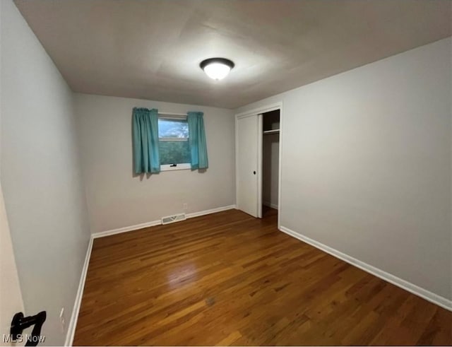 132 Highland Acres, Bloomingdale, OH 43910 - unfurnished bedroom with wood finished floors and a closet