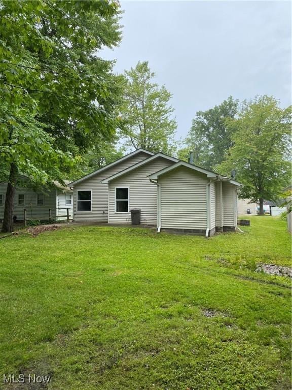 4920 Thomas Blvd, Geneva, OH 44041 - back of property featuring a yard