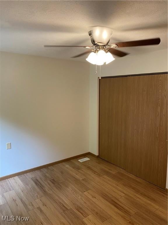 4920 Thomas Blvd, Geneva, OH 44041 - spare room featuring a ceiling fan and light wood finished floors