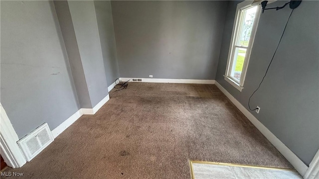 1682 E 33rd St, Lorain, OH 44055 - carpeted spare room with baseboards