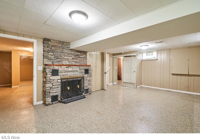 3371 Brecksville Rd, Richfield, OH 44286 - basement featuring a stone fireplace and a paneled ceiling
