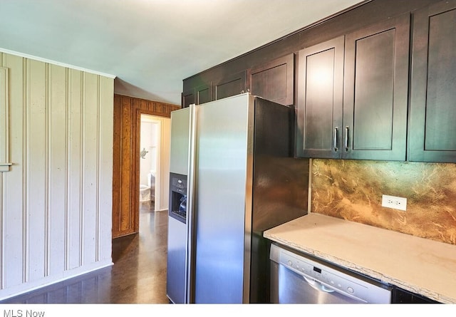 3371 Brecksville Rd, Richfield, OH 44286 - kitchen with appliances with stainless steel finishes, light countertops, and wooden walls