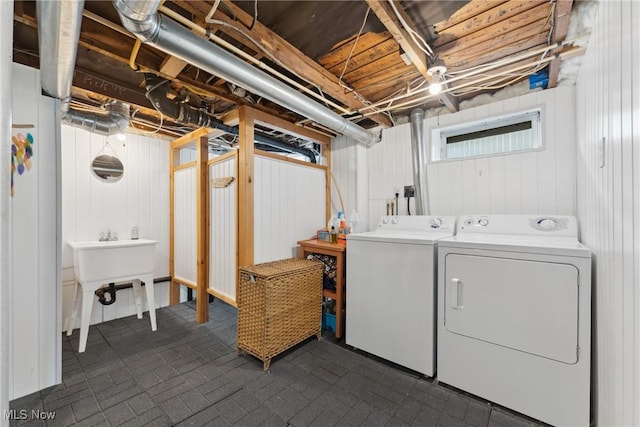 4324 Ormond Dr, New Franklin, OH 44319 - laundry room featuring separate washer and dryer and wood walls