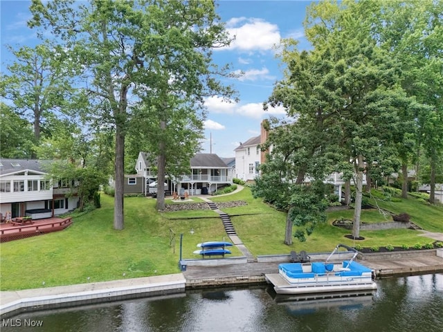 4324 Ormond Dr, New Franklin, OH 44319 - dock featuring a lawn, a water view, and a residential view