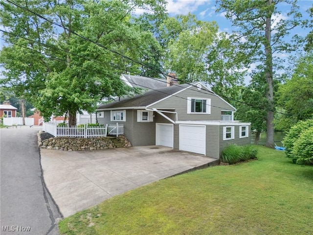 4324 Ormond Dr, New Franklin, OH 44319 - view of front of house featuring concrete driveway and a chimney