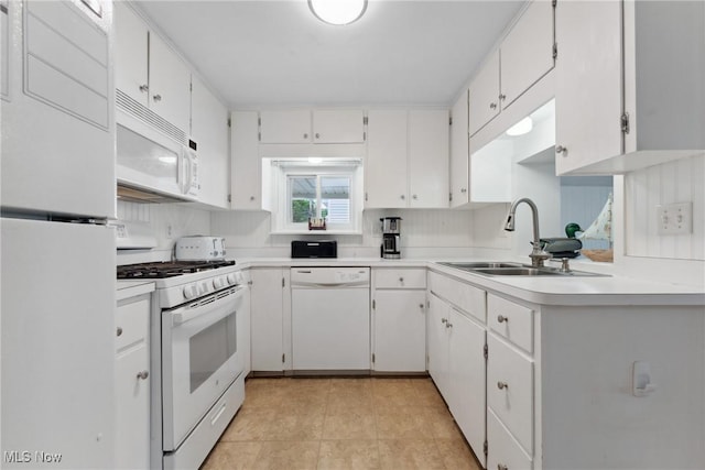 4324 Ormond Dr, New Franklin, OH 44319 - kitchen featuring white appliances, light countertops, and white cabinetry