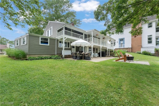 4324 Ormond Dr, New Franklin, OH 44319 - back of house featuring a patio area, an outdoor hangout area, a yard, and a chimney