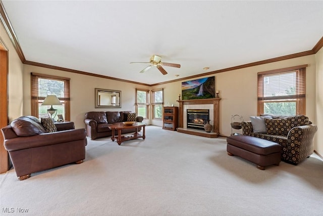 7700 Sparrow Flight Dr, Seven Hills, OH 44131 - living area featuring carpet, ornamental molding, ceiling fan, and a fireplace