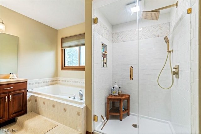 7700 Sparrow Flight Dr, Seven Hills, OH 44131 - full bath featuring a shower stall, vanity, and a garden tub