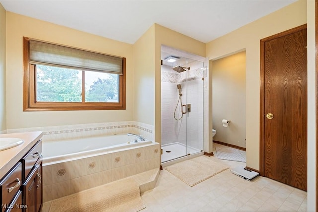 7700 Sparrow Flight Dr, Seven Hills, OH 44131 - full bathroom featuring a garden tub, a shower stall, vanity, and tile patterned floors